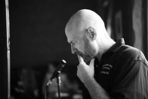 Nick deep in thought behind the DJ booth for an event in Norwell, MA 2025